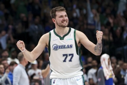 Mar 3, 2022; Dallas, Texas, USA;  Dallas Mavericks guard Luka Doncic (77) reacts during the second half against the Golden State Warriors at American Airlines Center. Mandatory Credit: Kevin Jairaj-USA TODAY Sports