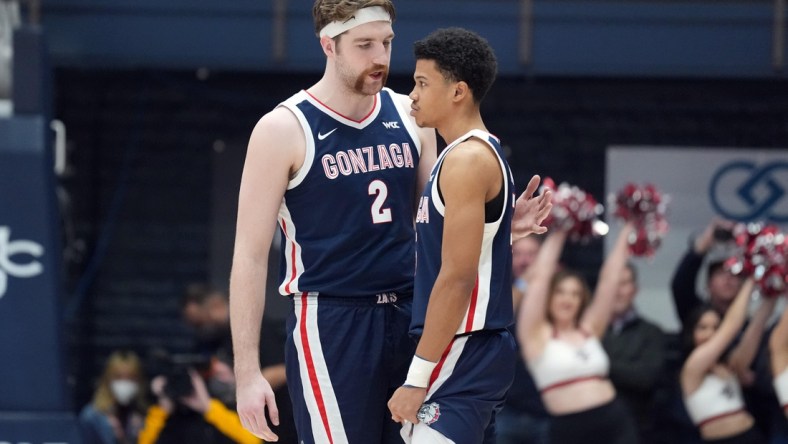 Feb 26, 2022; Moraga, California, USA; Gonzaga Bulldogs forward Drew Timme (2) talks to guard Rasir Bolton (45) before the game against the Saint Mary's Gaels at University Credit Union Pavilion. Mandatory Credit: Darren Yamashita-USA TODAY Sports