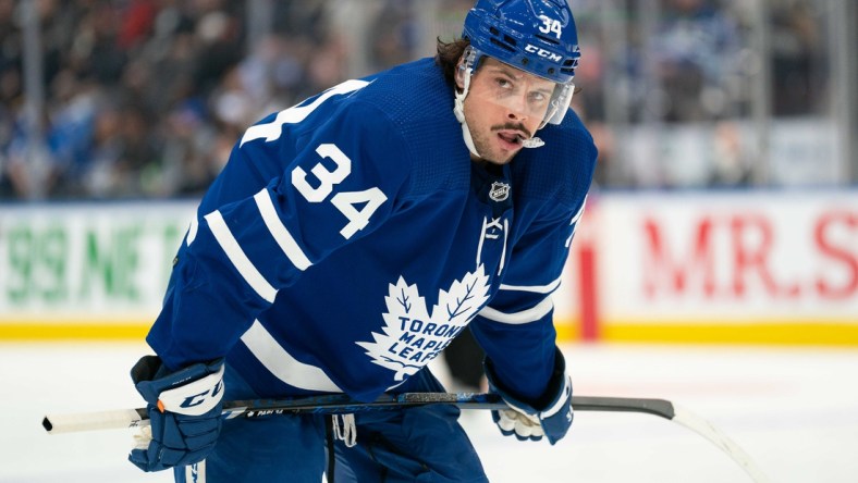 Mar 2, 2022; Toronto, Ontario, CAN; Toronto Maple Leafs center Auston Matthews (34) gets ready for the faceoff during the third period against the Buffalo Sabres at Scotiabank Arena. Mandatory Credit: Nick Turchiaro-USA TODAY Sports