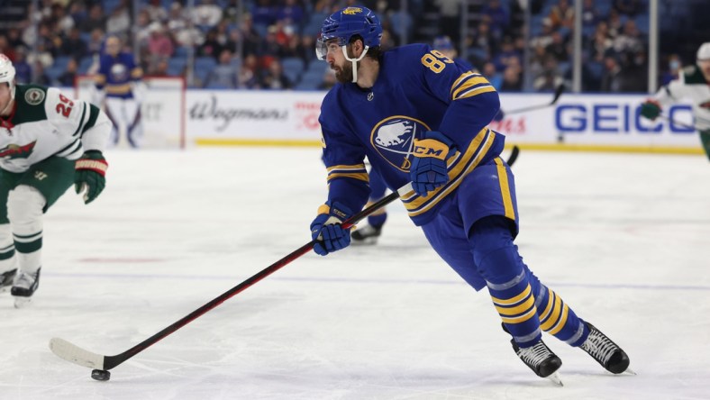 Mar 4, 2022; Buffalo, New York, USA;  Buffalo Sabres right wing Alex Tuch (89) looks to make a pass during the second period against the Minnesota Wild at KeyBank Center. Mandatory Credit: Timothy T. Ludwig-USA TODAY Sports