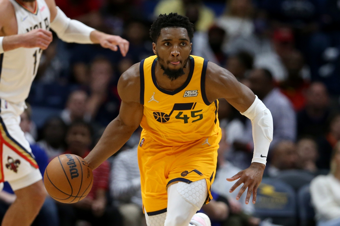 Mar 4, 2022; New Orleans, Louisiana, USA; Utah Jazz guard Donovan Mitchell (45) dribbles up court in the second half against the New Orleans Pelicans at the Smoothie King Center. Mandatory Credit: Chuck Cook-USA TODAY Sports