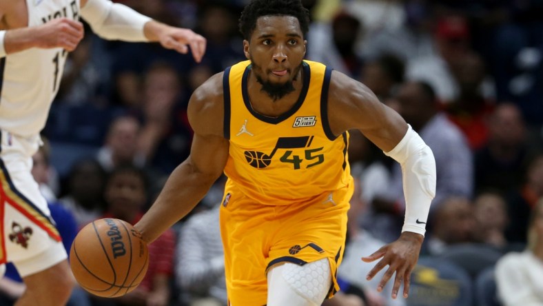 Mar 4, 2022; New Orleans, Louisiana, USA; Utah Jazz guard Donovan Mitchell (45) dribbles up court in the second half against the New Orleans Pelicans at the Smoothie King Center. Mandatory Credit: Chuck Cook-USA TODAY Sports