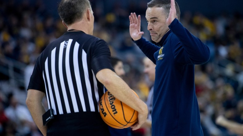 Murray State Head Coach Matt McMahon pleads his case with the referee during their semifinal game against Southeast Missouri of the 2022 Ohio Valley Conference Men's Basketball Championship at Ford Center in Evansville, Ind., March 4, 2022. Murray State won the game 88-74 and advanced to Saturday night's championship game.

Ds3422ovcmbksemi027