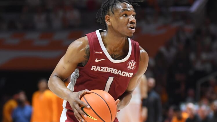 Arkansas guard JD Notae (1) dribbles the ball during the final regular season game between Tennessee and Arkansas at Thompson-Boling Arena in Knoxville, Tenn., Saturday, March 5, 2022. Tennessee defeated Arkansas 78-74.Utark0305 1551