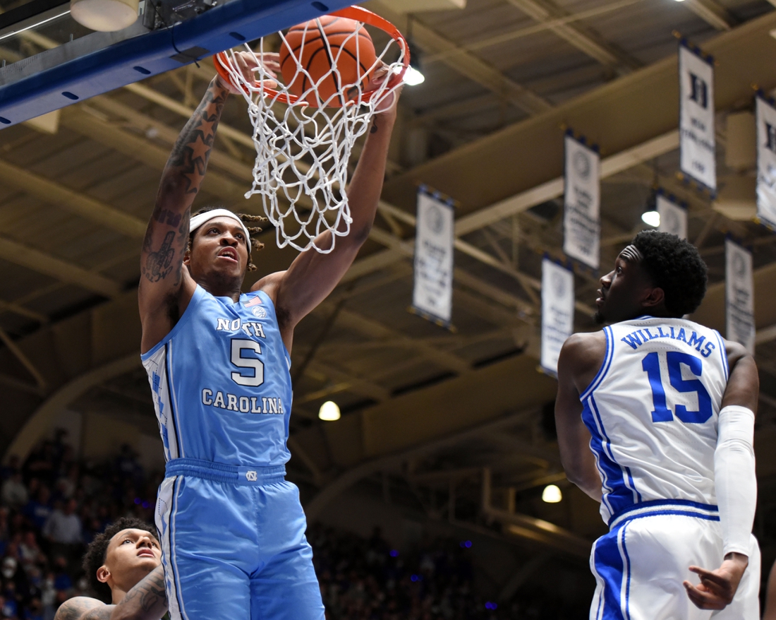 Mar 5, 2022; Durham, North Carolina, USA; North Carolina Tar Heels forward Armando Bacot (5) dunks the ball during the first half against the Duke Blue Devils at Cameron Indoor Stadium. Mandatory Credit: Rob Kinnan-USA TODAY Sports