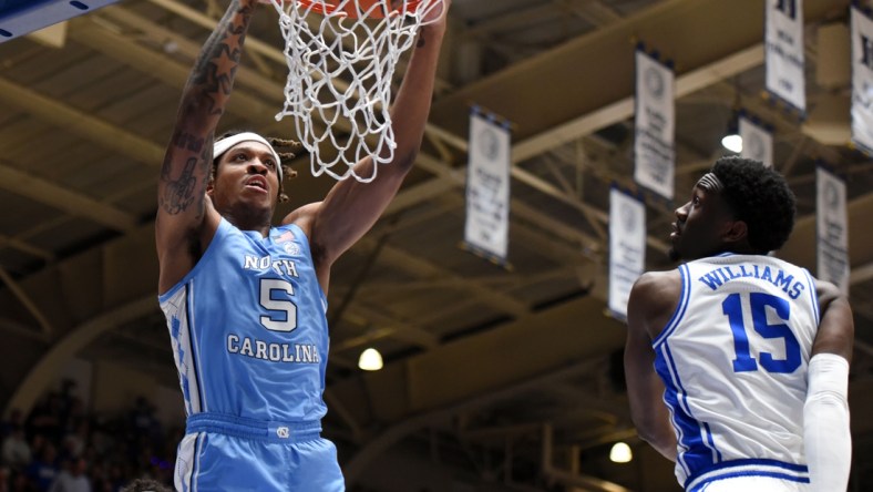 Mar 5, 2022; Durham, North Carolina, USA; North Carolina Tar Heels forward Armando Bacot (5) dunks the ball during the first half against the Duke Blue Devils at Cameron Indoor Stadium. Mandatory Credit: Rob Kinnan-USA TODAY Sports