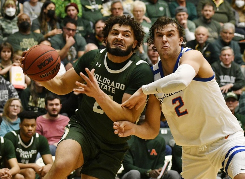 Mar 5, 2022; Fort Collins, Colorado, USA; Colorado State Rams guard David Roddy (left) drives to the basket against Boise State Broncos forward Tyson Degenhart (2) during the second half at Moby Arena. Mandatory Credit: John Leyba-USA TODAY Sports