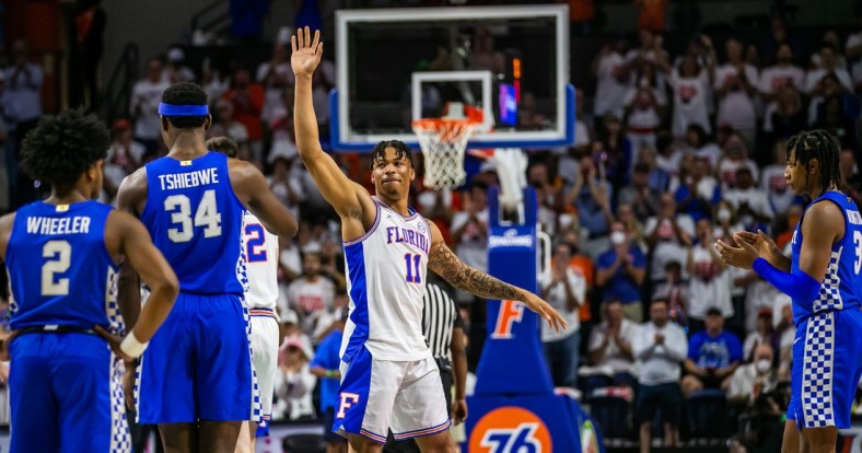 Florida Gators forward Keyontae Johnson (11) waves to the fans after ceremonially starting the game Saturday. Johnson fainted during a game last year and took a one lump sum of $5 million insurance payout. The team let him start the final game of the season. The Kentucky Wildcats lead 38-26 at the half over the Florida Gators Saturday afternoon, March 5, 2022 at the Stephen C. O'Connell Center in Gainesville, FL.

Gai Uf Kentucky Basketball