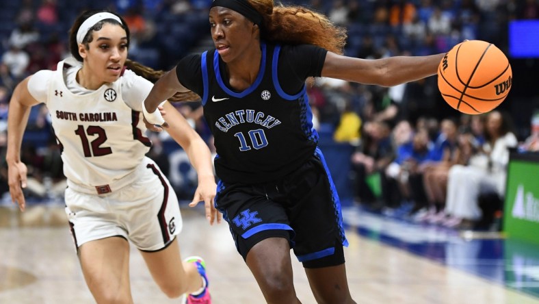 Kentucky guard Rhyne Howard (10) drives towards the basket while guarded by South Carolina guard Brea Beal (12) during the SEC women's basketball championship game in Nashville, Tenn. on Sunday, March 6, 2022.

Sec Sc Ky

Syndication The Tennessean