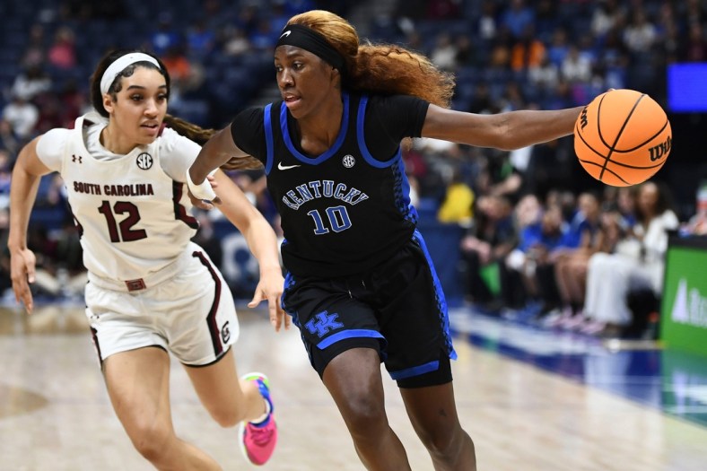 Kentucky guard Rhyne Howard (10) drives towards the basket while guarded by South Carolina guard Brea Beal (12) during the SEC women's basketball championship game in Nashville, Tenn. on Sunday, March 6, 2022.

Sec Sc Ky

Syndication The Tennessean
