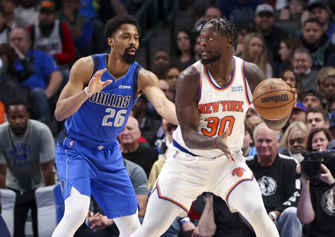 Mar 9, 2022; Dallas, Texas, USA;  New York Knicks forward Julius Randle (30) controls the ball as Dallas Mavericks guard Spencer Dinwiddie (26) defends during the first half at American Airlines Center. Mandatory Credit: Kevin Jairaj-USA TODAY Sports