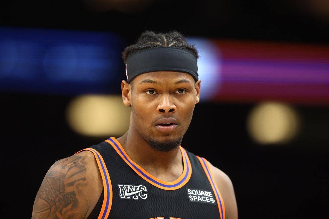 Mar 4, 2022; Phoenix, Arizona, USA; New York Knicks forward Cam Reddish (21) against the Phoenix Suns at Footprint Center. Mandatory Credit: Mark J. Rebilas-USA TODAY Sports