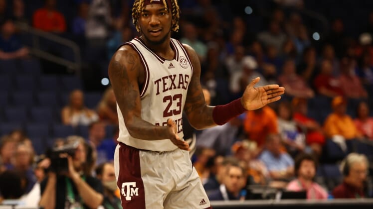 Mar 10, 2022; Tampa, FL, USA; Texas A&M Aggies guard Tyrece Radford (23) makes a three point basket against the Florida Gators during the first half at Amalie Arena. Mandatory Credit: Kim Klement-USA TODAY Sports