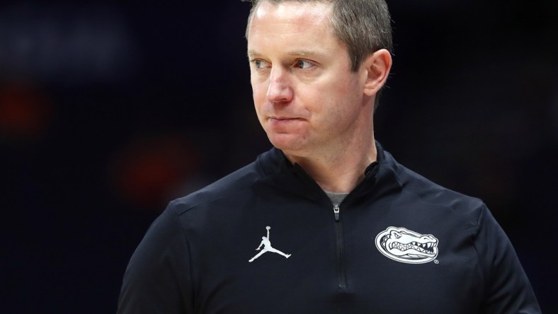 Mar 10, 2022; Tampa, FL, USA; Florida Gators head coach Mike White looks on against the Texas A&M Aggies during the first half at Amalie Arena. Mandatory Credit: Kim Klement-USA TODAY Sports