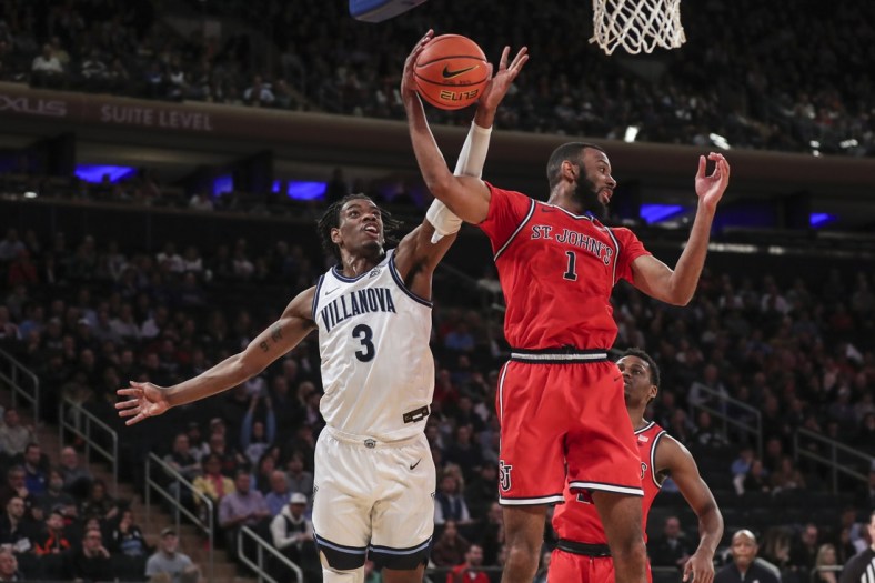 Mar 10, 2022; New York, NY, USA; Villanova Wildcats forward Brandon Slater (3) and St. John's Red Storm forward Aaron Wheeler (1) battle for a rebound in the first half at the Big East Tournament at Madison Square Garden. Mandatory Credit: Wendell Cruz-USA TODAY Sports