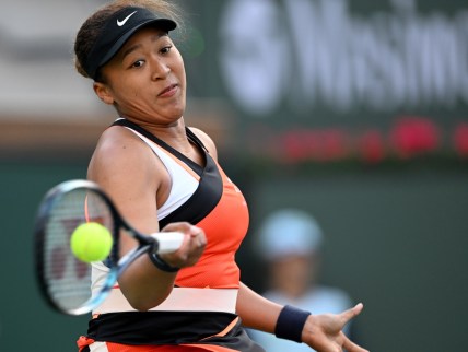 Mar 10, 2022; Indian Wells, CA, USA; Naomi Osaka (JPN) hits a shot in her first round match against Sloane Stephens (not pictured) on day 4 at the BNP Paribas Open at the Indian Wells Tennis Garden. Mandatory Credit: Jayne Kamin-Oncea-USA TODAY Sports