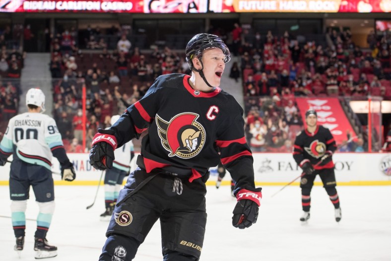 Mar 10, 2022; Ottawa, Ontario, CAN; Ottawa Senators left wing Brady Tkachuk (7) celebrates after scoring a goal against the Seattle Kraken in the second period at the Canadian Tire Centre. Mandatory Credit: Marc DesRosiers-USA TODAY Sports