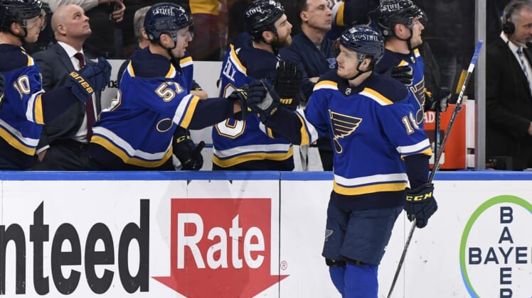 Mar 10, 2022; St. Louis, Missouri, USA; St. Louis Blues center Robert Thomas (18) is congratulated after scoring a goal against the New York Rangers during the first period at Enterprise Center. Mandatory Credit: Jeff Le-USA TODAY Sports