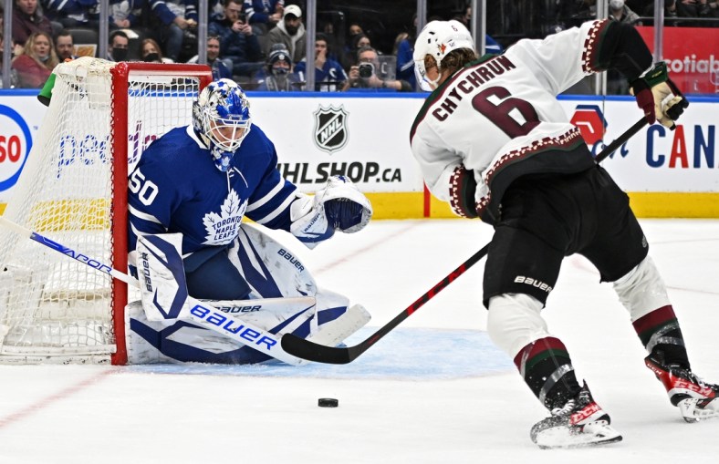 Mar 10, 2022; Toronto, Ontario, CAN; Arizona Coyotes defenseman Jakob Chychrun (6) moves in for a scoring attempt on Toronto Maple Leafs goalie Erik Kallgren (50) in the second period at Scotiabank Arena. Mandatory Credit: Dan Hamilton-USA TODAY Sports
