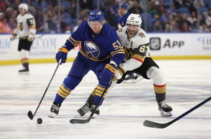 Mar 10, 2022; Buffalo, New York, USA;  Buffalo Sabres left wing Jeff Skinner (53) looks to control the puck as Vegas Golden Knights left wing Max Pacioretty (67) defends during the third period at KeyBank Center. Mandatory Credit: Timothy T. Ludwig-USA TODAY Sports