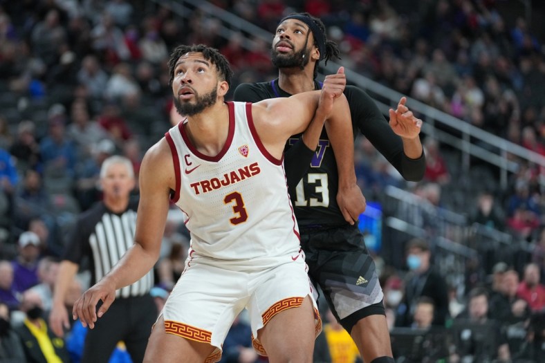 Mar 10, 2022; Las Vegas, NV, USA; USC Trojans forward Isaiah Mobley (3) blocks out Washington Huskies forward Langston Wilson (13) on a free throw attempt during the first half at T-Mobile Arena. Mandatory Credit: Stephen R. Sylvanie-USA TODAY Sports