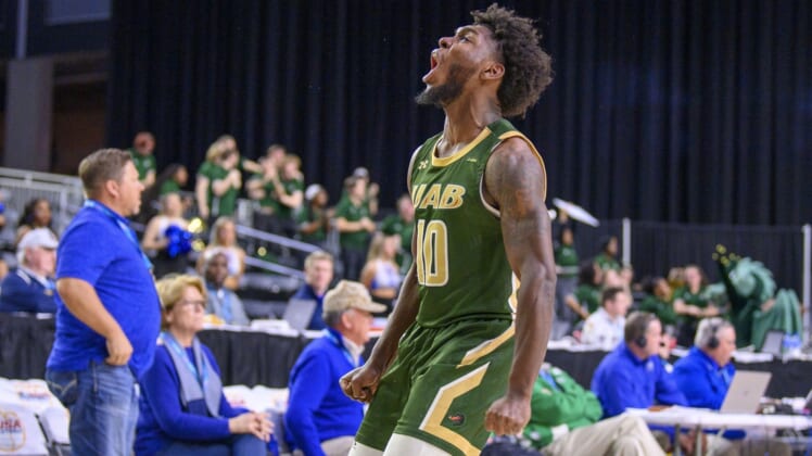 Mar 11, 2022; Frisco, TX, USA; UAB Blazers guard Jordan Walker (10) celebrates making a three point shot against the Middle Tennessee Blue Raiders at the end of the second half of the men s basketball semi-finals of the USA Conference Tournament at Ford Center at The Star. Mandatory Credit: Jerome Miron-USA TODAY Sports
