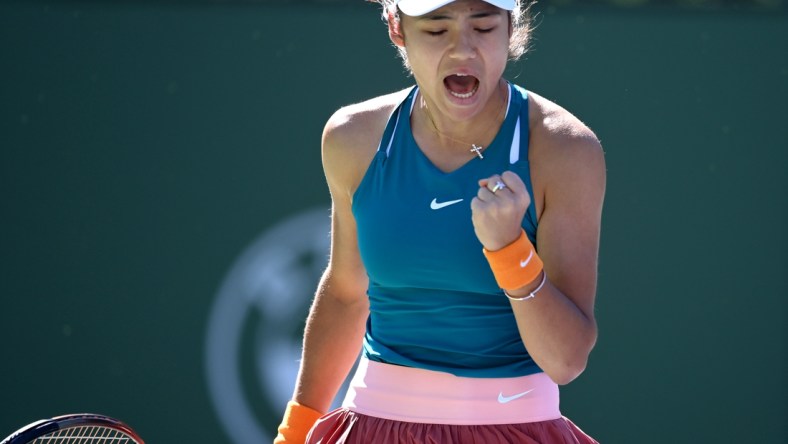 Mar 11, 2022; Indian Wells, CA, USA; Emma Raducanu (GBR) reacts after winning a point in action as she defeats Caroline Garcia (FRA) in her 2nd round match at the BNP Paribas Open at the Indian Wells Tennis Garden. Mandatory Credit: Jayne Kamin-Oncea-USA TODAY Sports