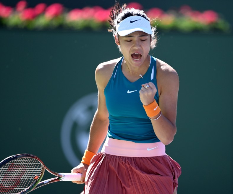 Mar 11, 2022; Indian Wells, CA, USA; Emma Raducanu (GBR) reacts after winning a point in action as she defeats Caroline Garcia (FRA) in her 2nd round match at the BNP Paribas Open at the Indian Wells Tennis Garden. Mandatory Credit: Jayne Kamin-Oncea-USA TODAY Sports