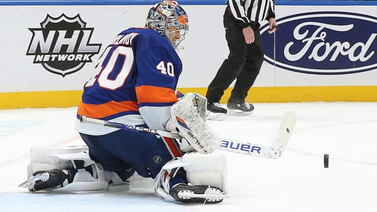 Mar 11, 2022; Elmont, New York, USA; New York Islanders goaltender Semyon Varlamov (40) makes a save against the Winnipeg Jets during the third period at UBS Arena. Mandatory Credit: Andy Marlin-USA TODAY Sports