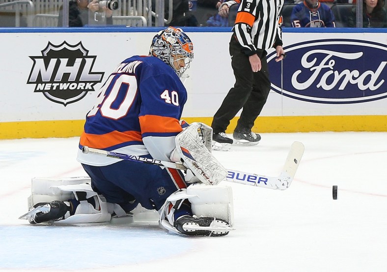 Mar 11, 2022; Elmont, New York, USA; New York Islanders goaltender Semyon Varlamov (40) makes a save against the Winnipeg Jets during the third period at UBS Arena. Mandatory Credit: Andy Marlin-USA TODAY Sports