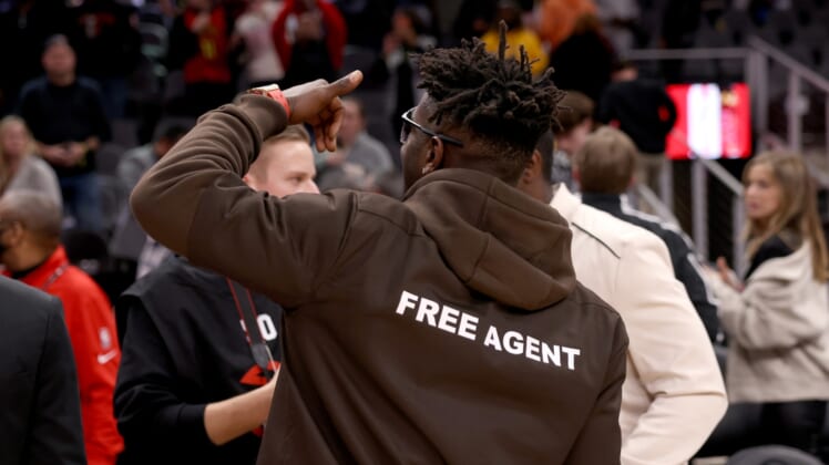 Mar 11, 2022; Atlanta, Georgia, USA; Former Tampa Bay Buccaneers wide receiver Antonio Brown reacts to fans after the game between the Atlanta Hawks and the LA Clippers at State Farm Arena. Mandatory Credit: Jason Getz-USA TODAY Sports