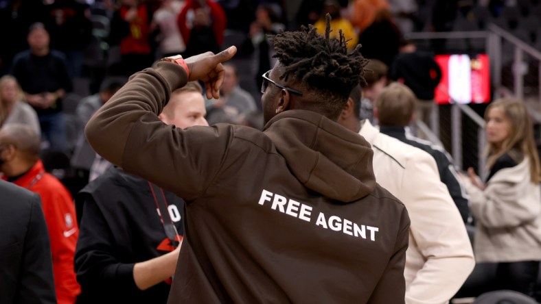 Mar 11, 2022; Atlanta, Georgia, USA; Former Tampa Bay Buccaneers wide receiver Antonio Brown reacts to fans after the game between the Atlanta Hawks and the LA Clippers at State Farm Arena. Mandatory Credit: Jason Getz-USA TODAY Sports