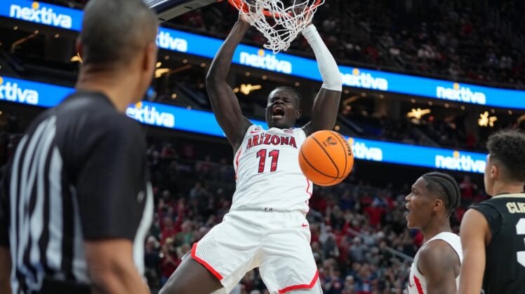 Mar 11, 2022; Las Vegas, NV, USA; Arizona Wildcats center Oumar Ballo (11) dunks against the Colorado Buffaloes during the second half at T-Mobile Arena. Mandatory Credit: Stephen R. Sylvanie-USA TODAY Sports
