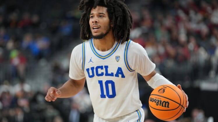 Mar 11, 2022; Las Vegas, NV, USA; UCLA Bruins guard Tyger Campbell (10) dribbles the ball in a game against the USC Trojans during the second half at T-Mobile Arena. Mandatory Credit: Stephen R. Sylvanie-USA TODAY Sports