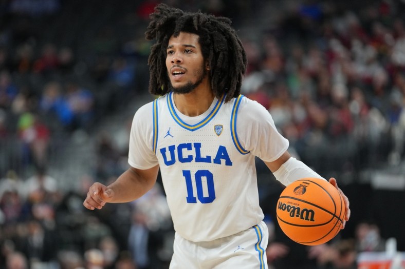 Mar 11, 2022; Las Vegas, NV, USA; UCLA Bruins guard Tyger Campbell (10) dribbles the ball in a game against the USC Trojans during the second half at T-Mobile Arena. Mandatory Credit: Stephen R. Sylvanie-USA TODAY Sports