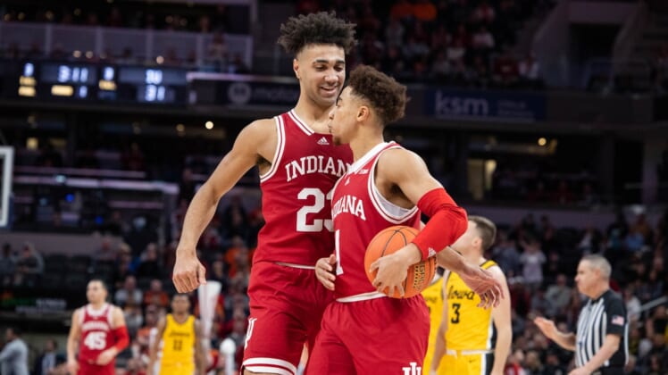 Mar 12, 2022; Indianapolis, IN, USA; Indiana Hoosiers forward Trayce Jackson-Davis (23) and guard Rob Phinisee (1) celebrate a play  in the first half against the Iowa Hawkeyes at Gainbridge Fieldhouse. Mandatory Credit: Trevor Ruszkowski-USA TODAY Sports