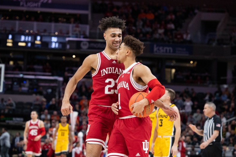 Mar 12, 2022; Indianapolis, IN, USA; Indiana Hoosiers forward Trayce Jackson-Davis (23) and guard Rob Phinisee (1) celebrate a play  in the first half against the Iowa Hawkeyes at Gainbridge Fieldhouse. Mandatory Credit: Trevor Ruszkowski-USA TODAY Sports