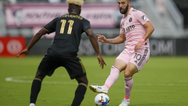 Mar 12, 2022; Fort Lauderdale, Florida, USA; Inter Miami CF forward Gonzalo Higuain (10) passes the ball in front of Los Angeles FC midfielder Jos  Cifuentes (11) during the first half at Inter Miami CF Stadium. Mandatory Credit: Sam Navarro-USA TODAY Sports