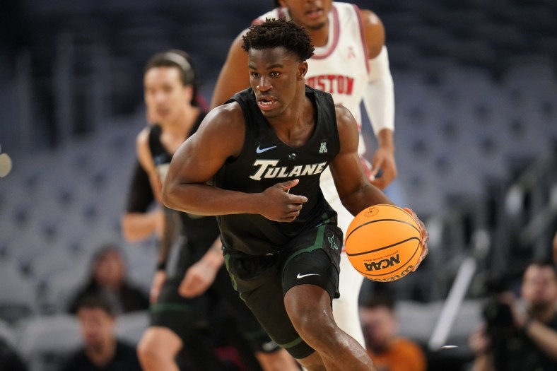 Mar 12, 2022; Fort Worth, TX, USA;  Tulane Green Wave guard Sion James (1) pushes the ball up the court against the Houston Cougars during the first half at Dickies Arena. Mandatory Credit: Chris Jones-USA TODAY Sports