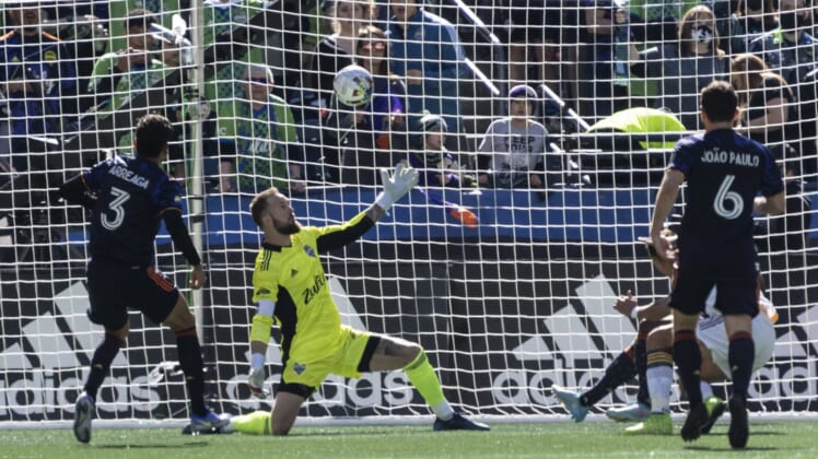 Mar 12, 2022; Seattle, Washington, USA; Seattle Sounders FC goalkeeper Stefan Frei (24) cannot get to a shot by LA Galaxy forward Chichirito (14) during the first half at Lumen Field. Mandatory Credit: Stephen Brashear-USA TODAY Sports