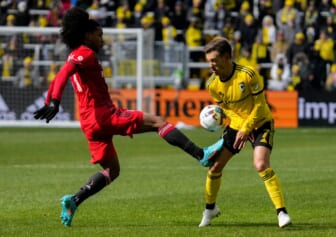 Sat., Mar. 12, 2022; Columbus, Ohio, USA; Toronto FC forward Jayden Nelson (11) hits Columbus Crew forward Pedro Santos (7) in the thigh while fighting for the ball during the second half of a MLS game between the Columbus Crew and Toronto FC at Lower.com Field.Mls Toronto Fc At Columbus Crew