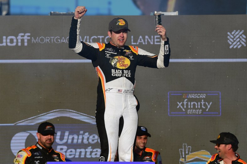 Mar 12, 2022; Avondale, Arizona, USA; NASCAR Xfinity Series driver Noah Gragson (9) celebrates his victory of the United Rentals 200 at Phoenix Raceway. Mandatory Credit: Gary A. Vasquez-USA TODAY Sports