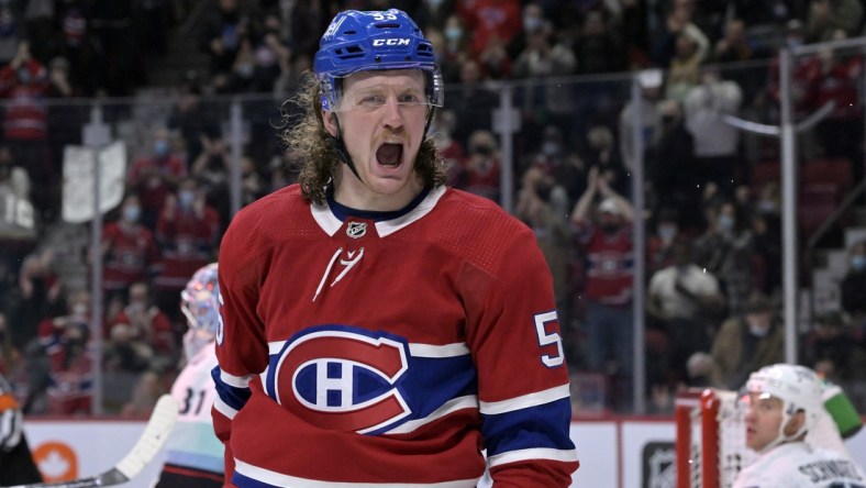 Mar 12, 2022; Montreal, Quebec, CAN; Montreal Canadiens forward Michael Pezzetta (55) reacts after scoring a goal against Seattle Kraken goalie Philipp Grubauer (31) during the first period at the Bell Centre. Mandatory Credit: Eric Bolte-USA TODAY Sports