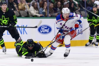 Mar 12, 2022; Dallas, Texas, USA; New York Rangers left wing Artemi Panarin (10) skates with the puck past Dallas Stars center Tyler Seguin (91) during the first period at the American Airlines Center. Mandatory Credit: Jerome Miron-USA TODAY Sports