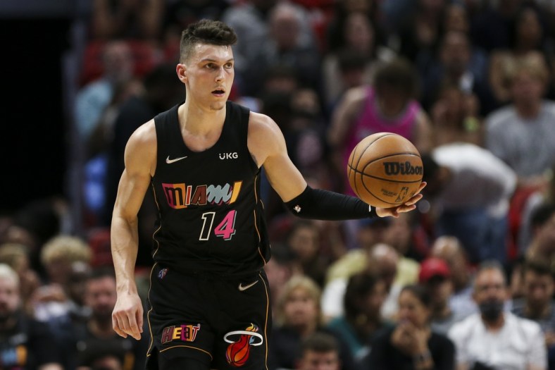 Mar 12, 2022; Miami, Florida, USA; Miami Heat guard Tyler Herro (14) dribbles the basketball during the first quarter of the game against the Minnesota Timberwolves at FTX Arena. Mandatory Credit: Sam Navarro-USA TODAY Sports