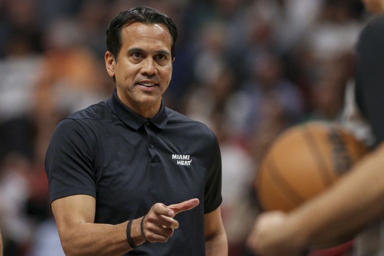 Mar 12, 2022; Miami, Florida, USA; Miami Heat head coach Erik Spoelstra talks to a game official during a timeout in the fourth quarter of the game against the Minnesota Timberwolves at FTX Arena. Mandatory Credit: Sam Navarro-USA TODAY Sports