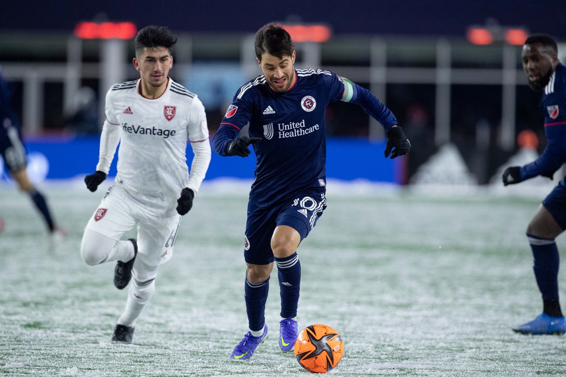 Mar 12, 2022; Foxborough, Massachusetts, USA; New England Revolution midfielder Carles Gil (10) possesses the ball during the second half against Real Salt Lake at Gillette Stadium. Mandatory Credit: Paul Rutherford-USA TODAY Sports