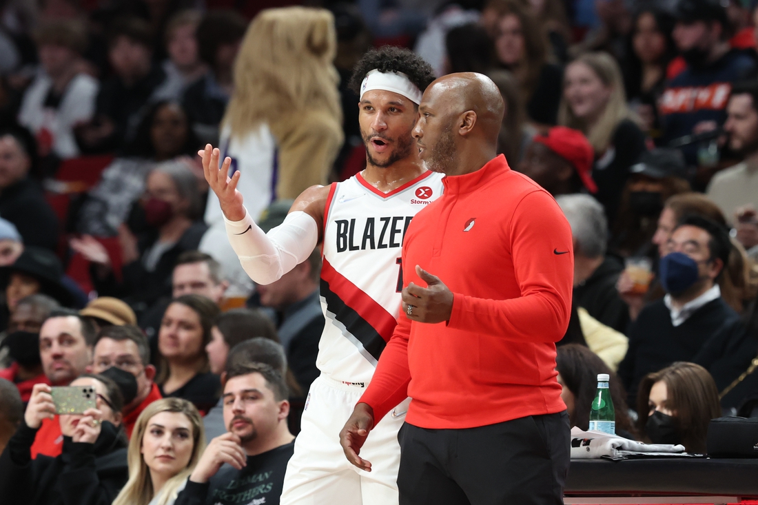 Mar 12, 2022; Portland, Oregon, USA; Portland Trail Blazers guard Josh Hart (11) and head coach Chauncey Billups talk during the second half of a game against the Washington Wizards at Moda Center. Mandatory Credit: Al Sermeno-USA TODAY Sports