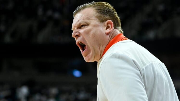 Illinois' head coach Brad Underwood argues a call during the first half in the game against Michigan State on Saturday, Feb. 19, 2022, at the Breslin Center in East Lansing.220219 Msu Illinois 061aSyndication Lansing State Journal