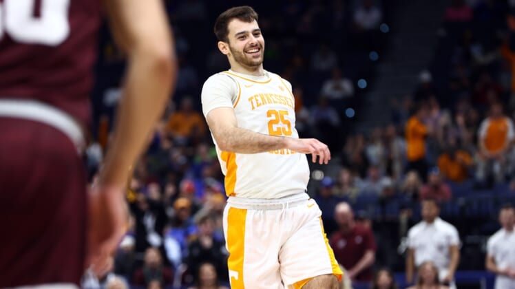 Mar 13, 2022; Tampa, FL, USA; Tennessee Volunteers guard Santiago Vescovi (25) smiles after making a three point basket against the Texas A&M Aggies during the second half at Amalie Arena. Mandatory Credit: Kim Klement-USA TODAY Sports